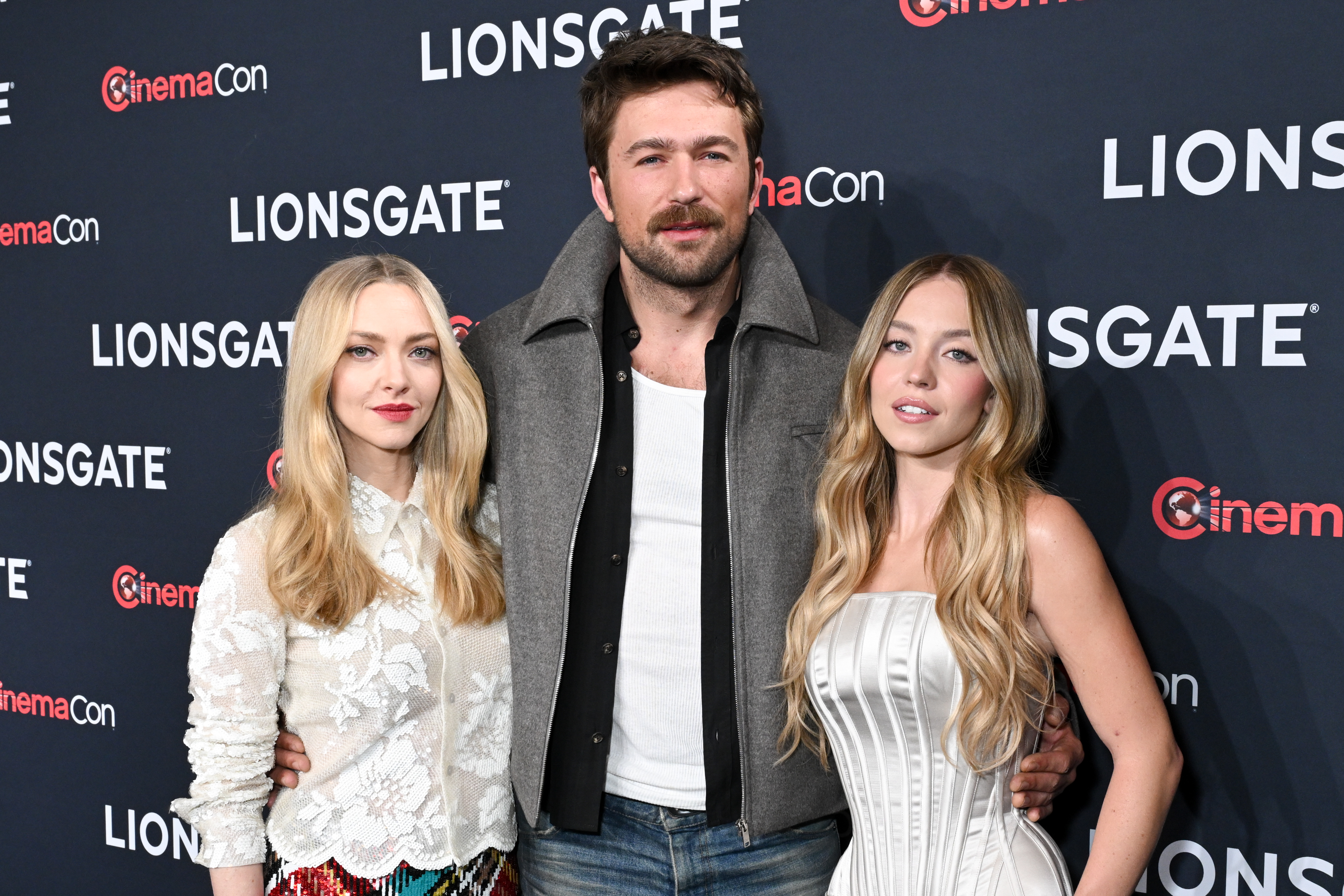 "The Housemaid" costars Amanda Seyfried, Brandon Sklenar, and Sydney Sweeney at the "State of the Industry" and Lionsgate Presentation as part of CinemaCon 2025 on April 1, 2025 | Source: Getty Images