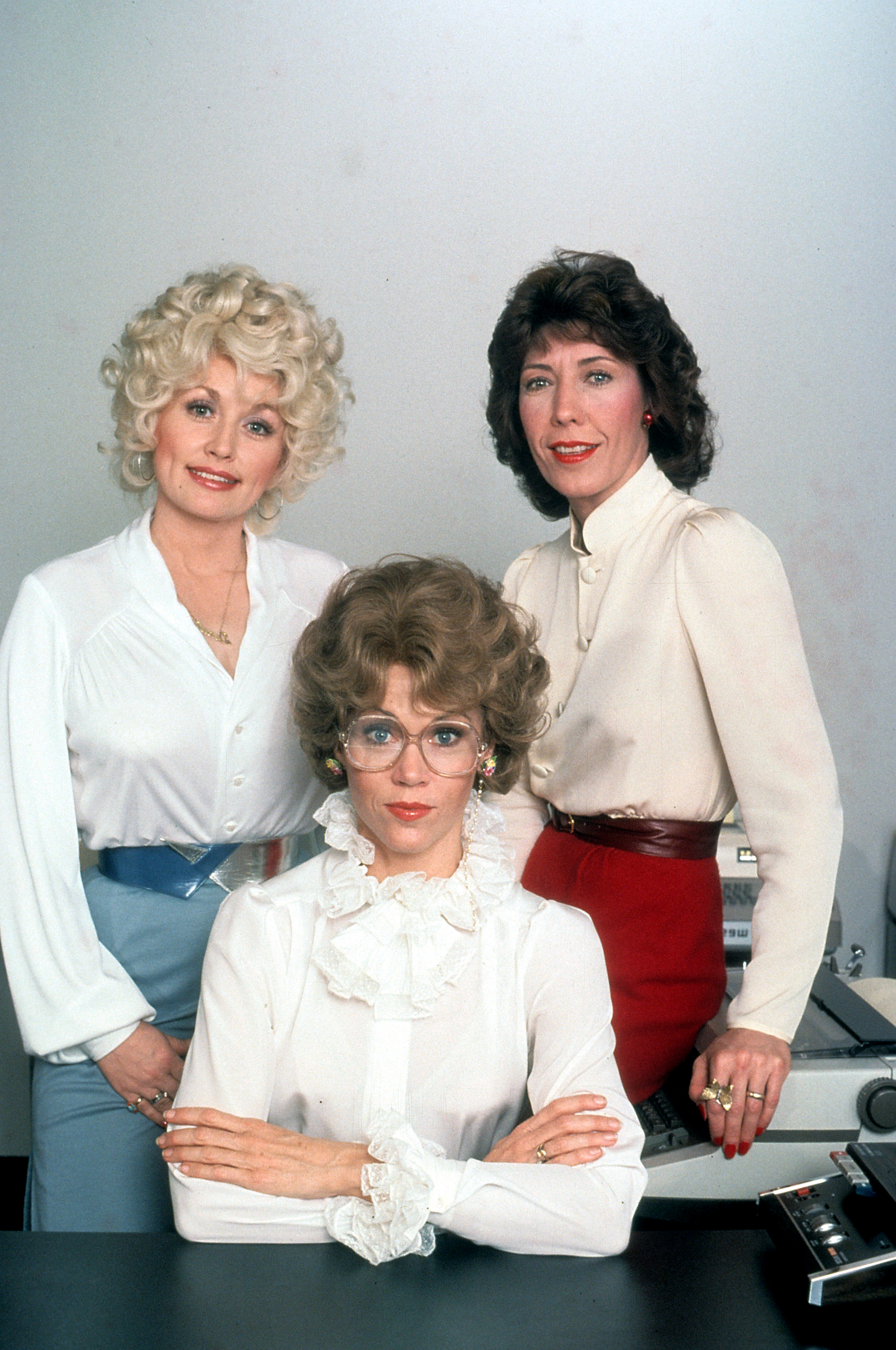 Dolly Parton, Jane Fonda and Lily Tomlin in publicity portrait for the film '9 to 5', 1980 | Source: Getty Images