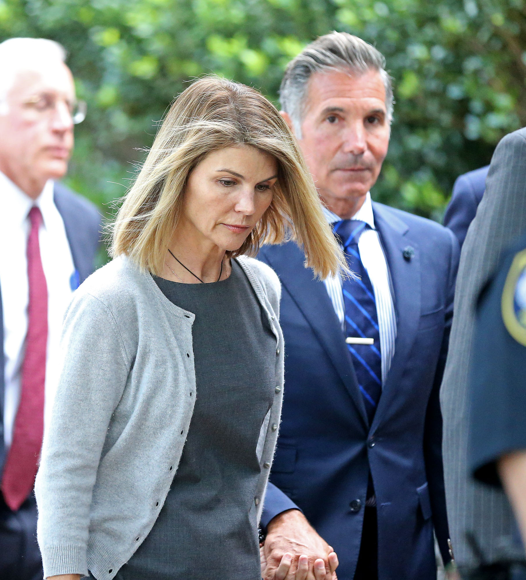 Lori Loughlin and Mossimo Giannulli photographed leaving Moakley Federal Courthouse after a brief hearing on August 27, 2019 in Boston, | Source: Getty Images