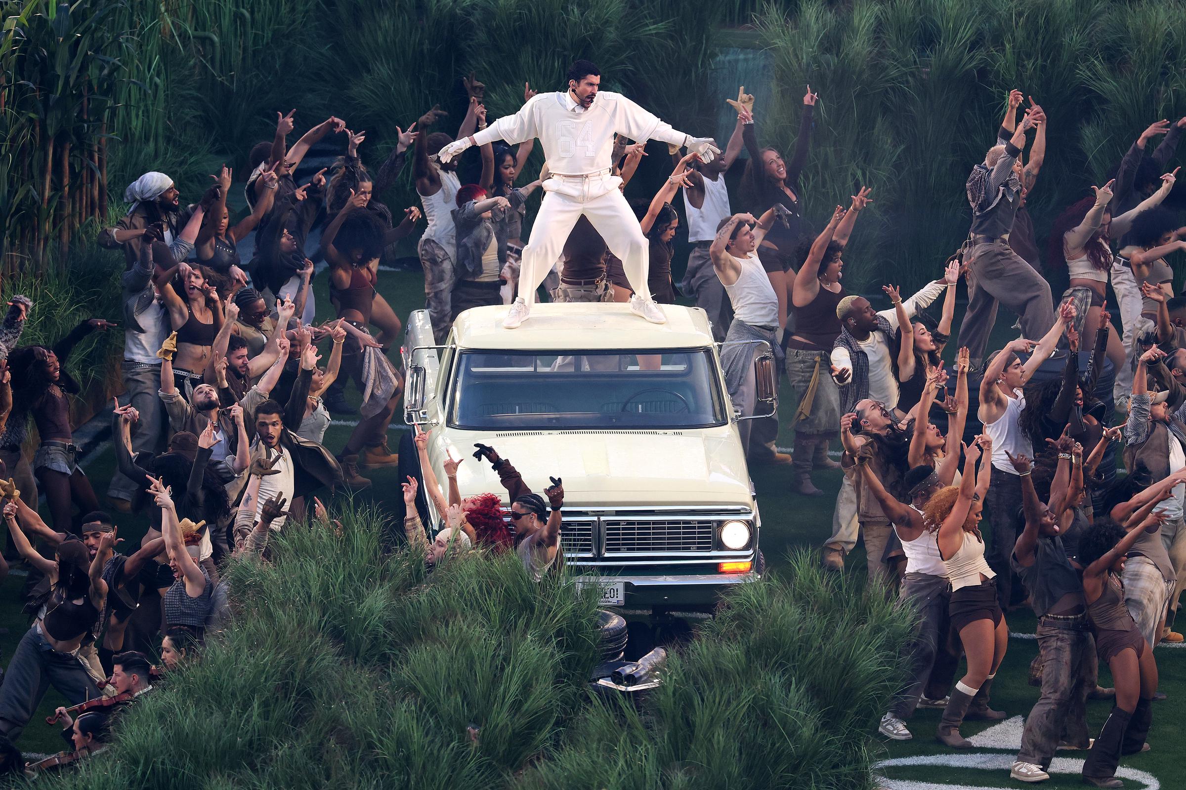 Bad Bunny performing on top of a pick-up truck during the Apple Music Super Bowl LX Halftime Show on February 6, 2026 | Source: Getty Images
