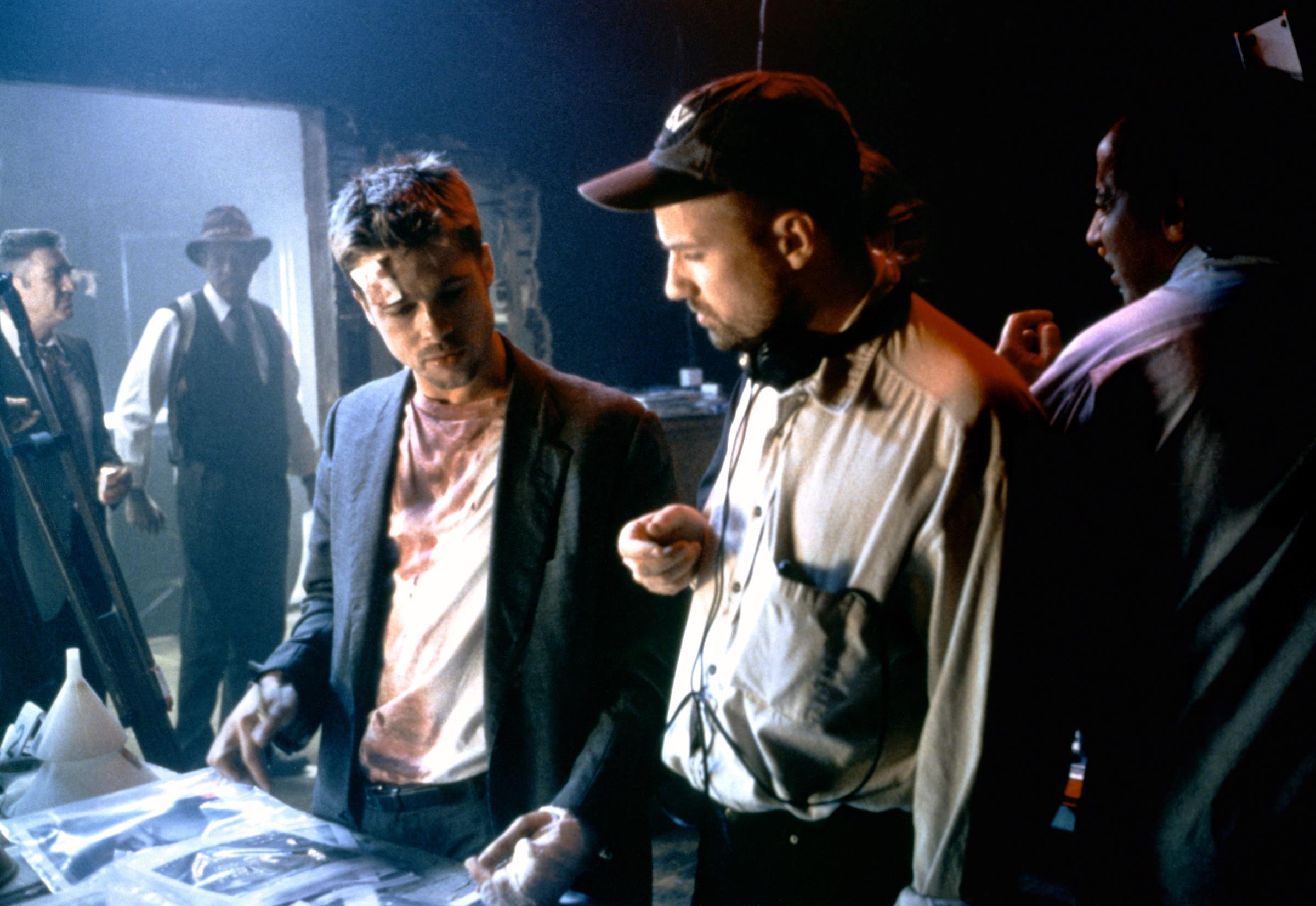 Brad Pitt and David Fincher on the set of the movie "Se7en" in 1995 | Source: Getty Images