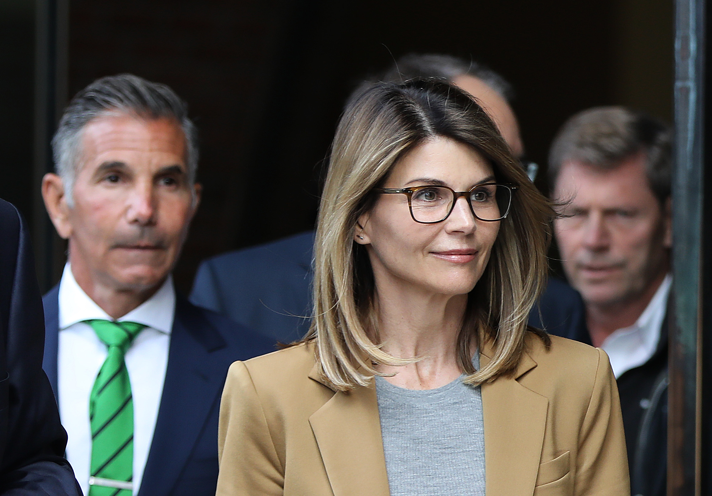 Mossimo Giannulli and Lori Loughlin arriving in court in Boston on April 3, 2019 | Source: Getty Images